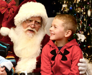 Child talking with Santa